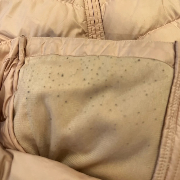 The north face 
Pink puffer vest 
Pilling on inside, Small stains on front - Picture 8 of 9